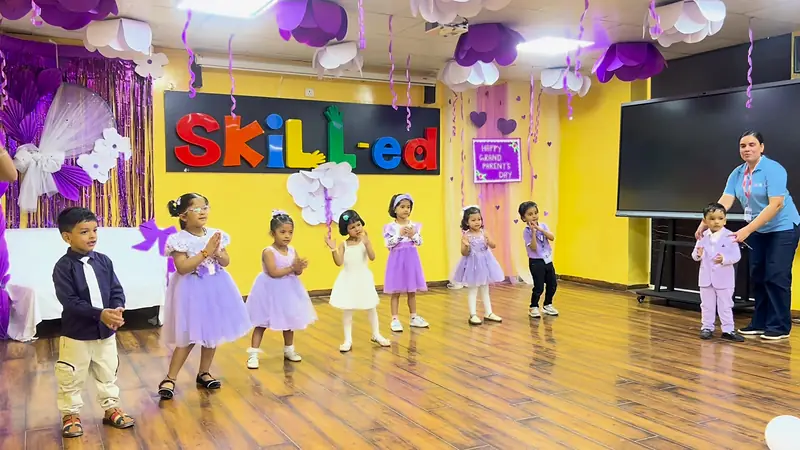 The youngest students line up to perform
